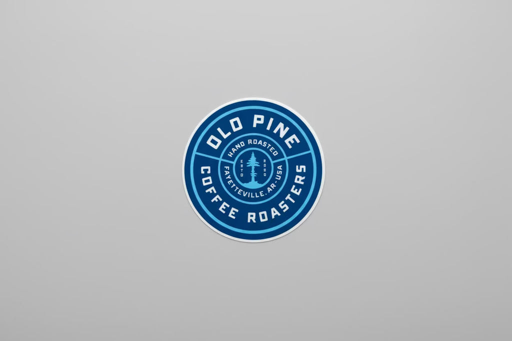 Blue Old Pine branded badge sticker, circular design with signature logo 