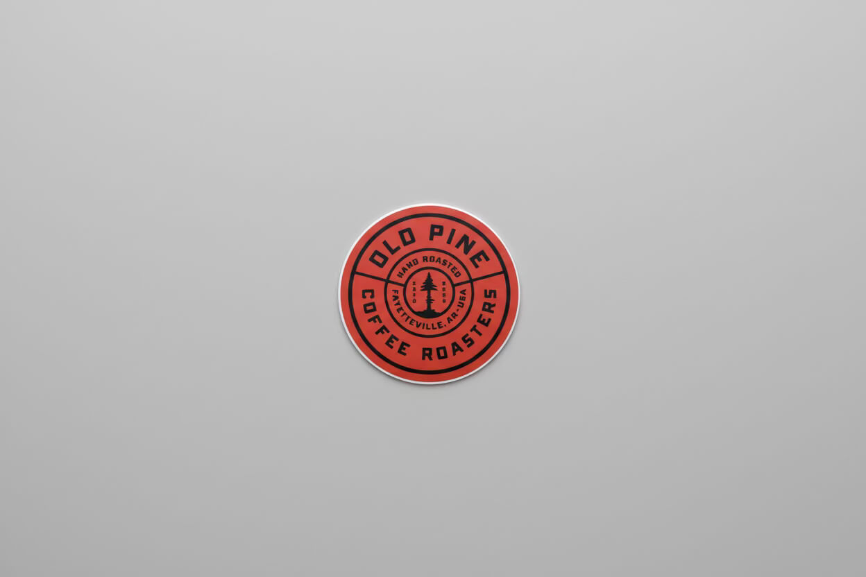 Red Old Pine branded badge sticker, circular design with signature logo 