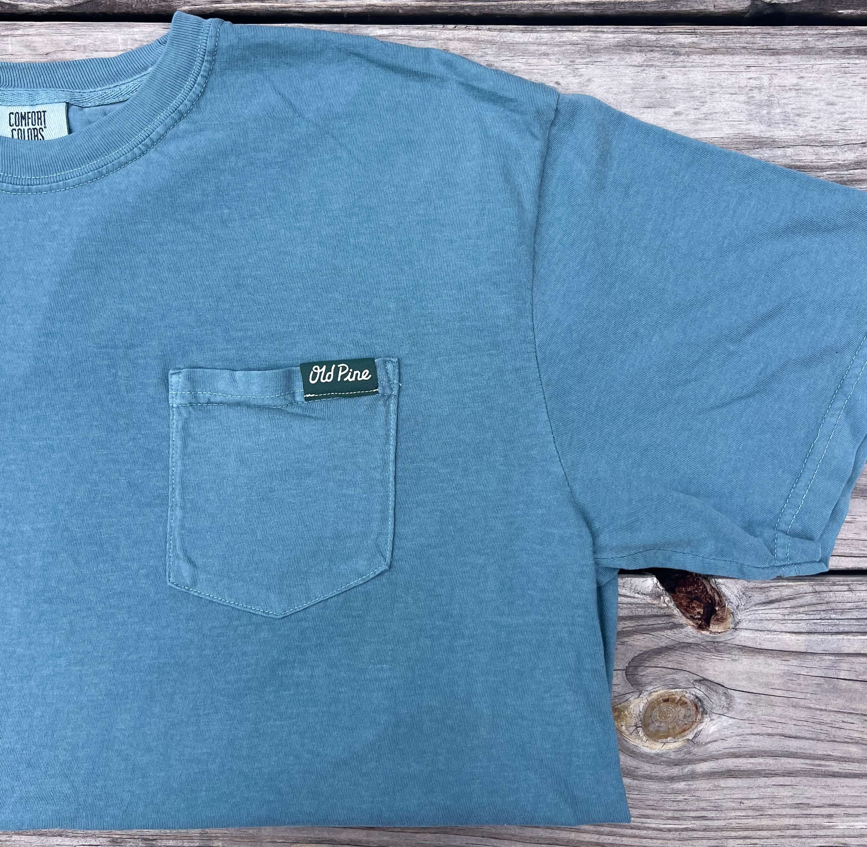 Blue T-shirt with Old Pine nametag on front pocket 