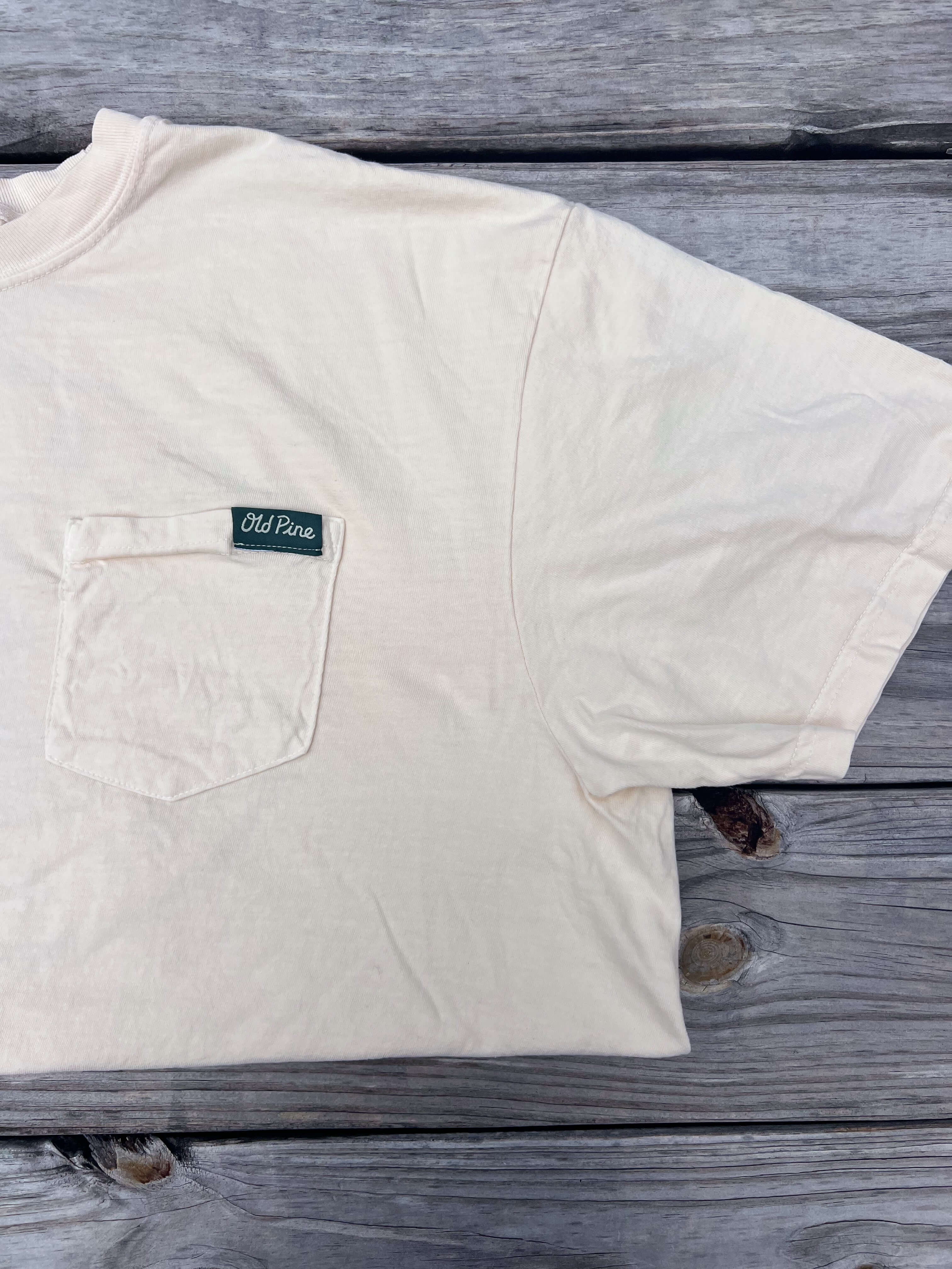 Cream T-shirt with Old Pine nametag on front pocket 